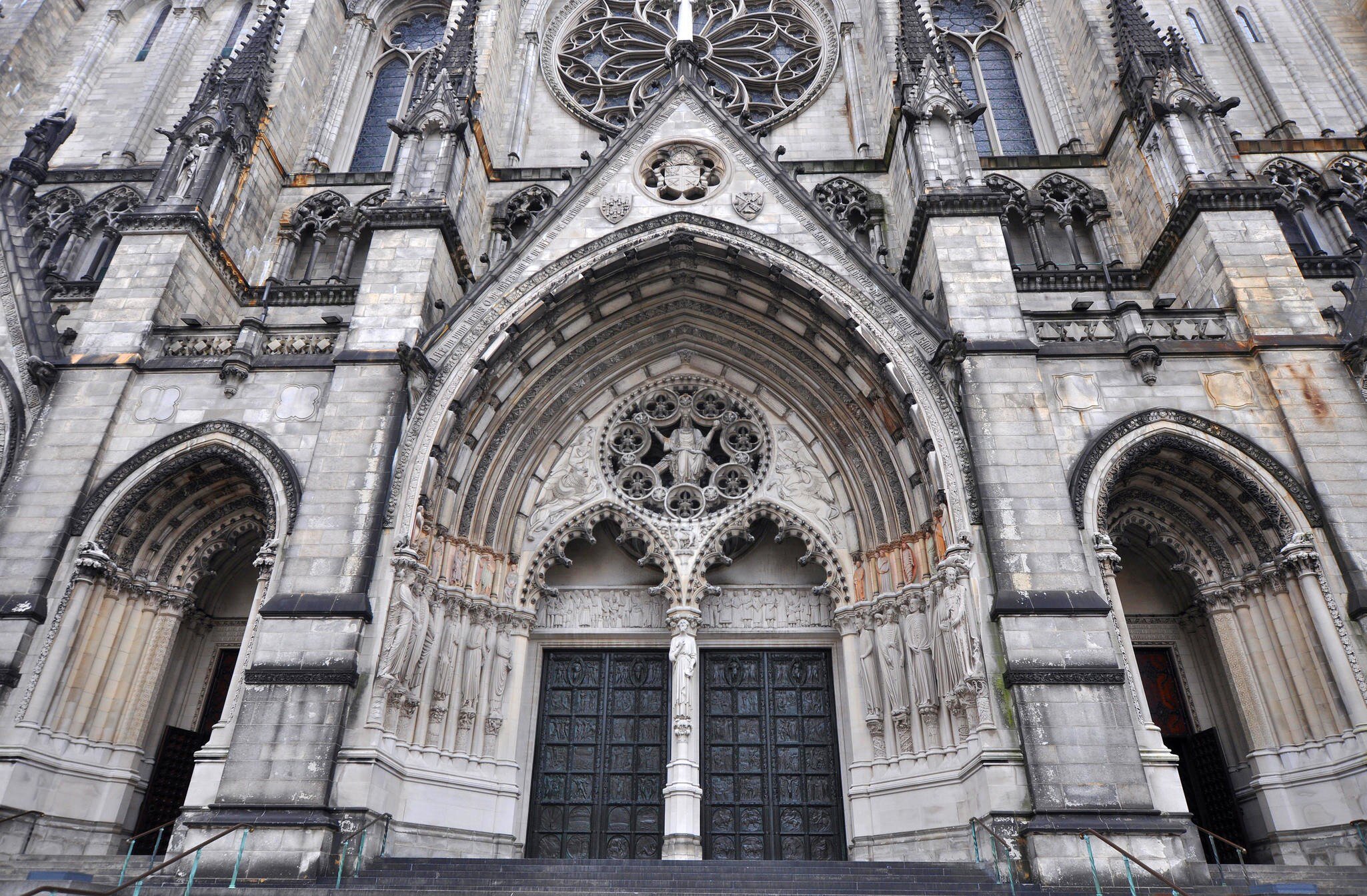 Exterior with many gothic details against a deep blue sky of the gothic medieval cathedral of Saint John, one of the top attractions of Den Bosch, 's-Hertogenbosch, Netherlands; Shutterstock ID 180468908; Your name (First / Last): Josh Vogel; Proj...