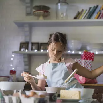 Girl is dancing while baking. Child is preparing food in kitchen. She is wearing apron.
656224593
Concentration, Leisure Activity, Lifestyles, Preparation, Childhood