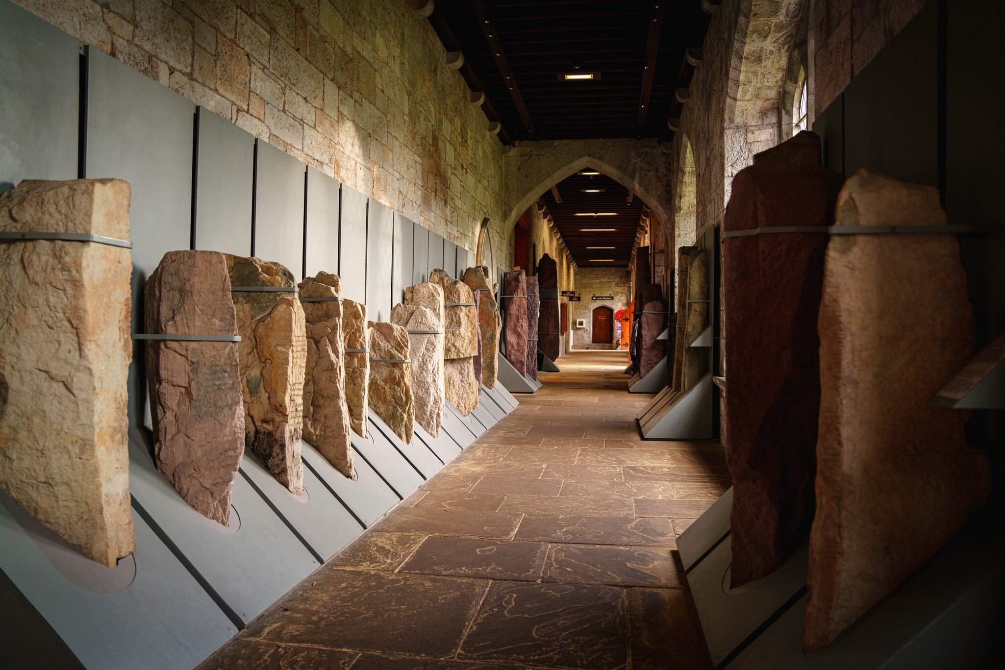 Ogham stones in the Stone Corridor at University College Cork, a historic collection of carved stone open to the public. Cork, Ireland.
