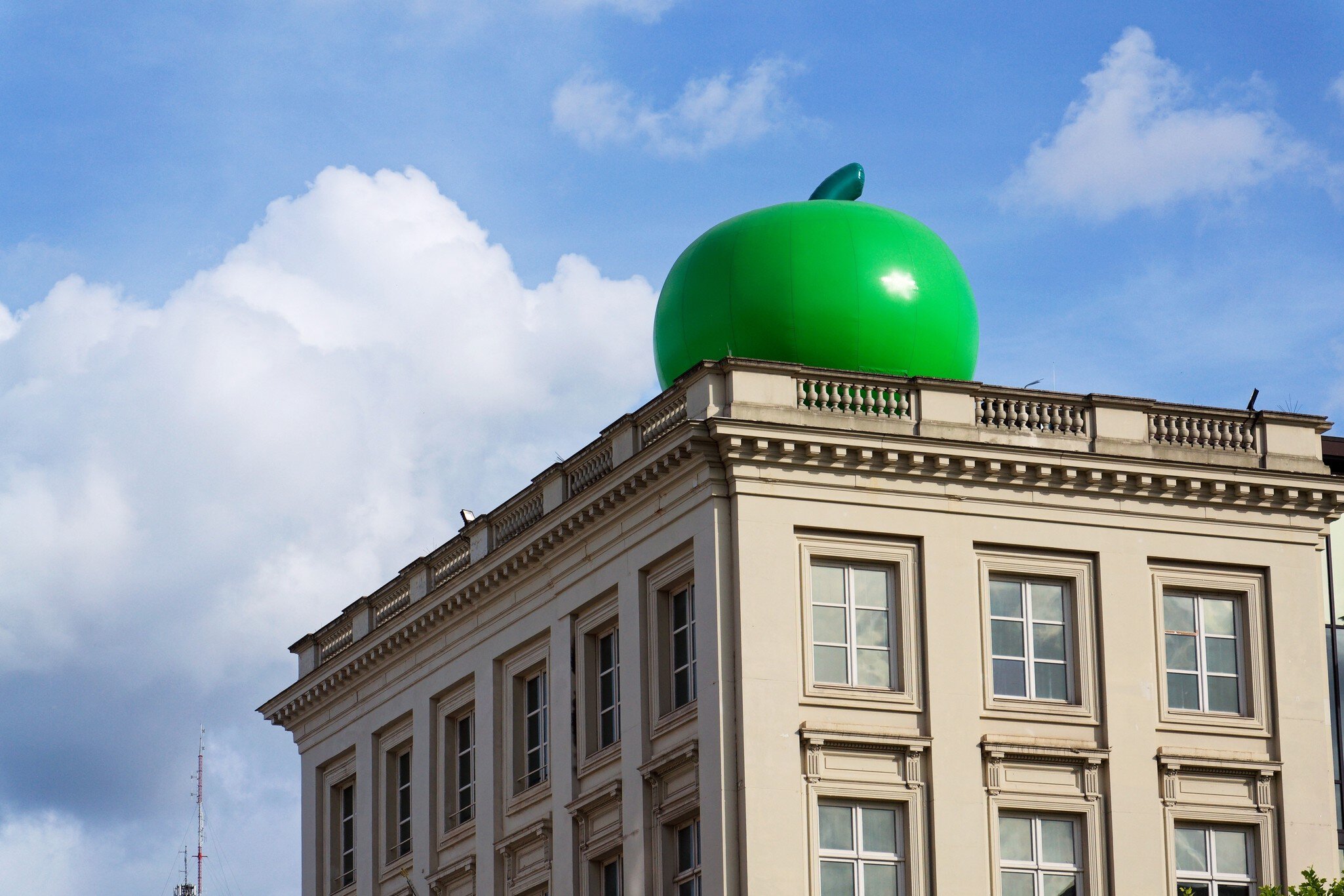 BRUSSELS, BELGIUM – MAY 25 2025: Giant green apple on the roof of Musee Magritte Museum near Mont des Arts garden and Place Royale on May 25, 2025 in Brussels, Belgium., License Type: media, Download Time: 2026-04-24T13:56:22.000Z, User: LP_NZhan, Editorial: true, purchase_order: 65050 - Digital Destinations and Articles, job: App content, client: Lonely Planet App, other: Nadine Zhan