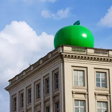 BRUSSELS, BELGIUM – MAY 25 2025: Giant green apple on the roof of Musee Magritte Museum near Mont des Arts garden and Place Royale on May 25, 2025 in Brussels, Belgium., License Type: media, Download Time: 2026-04-24T13:56:22.000Z, User: LP_NZhan, Editorial: true, purchase_order: 65050 - Digital Destinations and Articles, job: App content, client: Lonely Planet App, other: Nadine Zhan