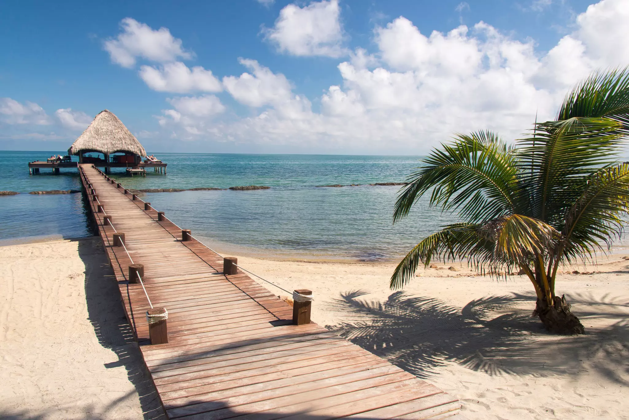 A boardwalk on the beach at Placencia, Belize. 