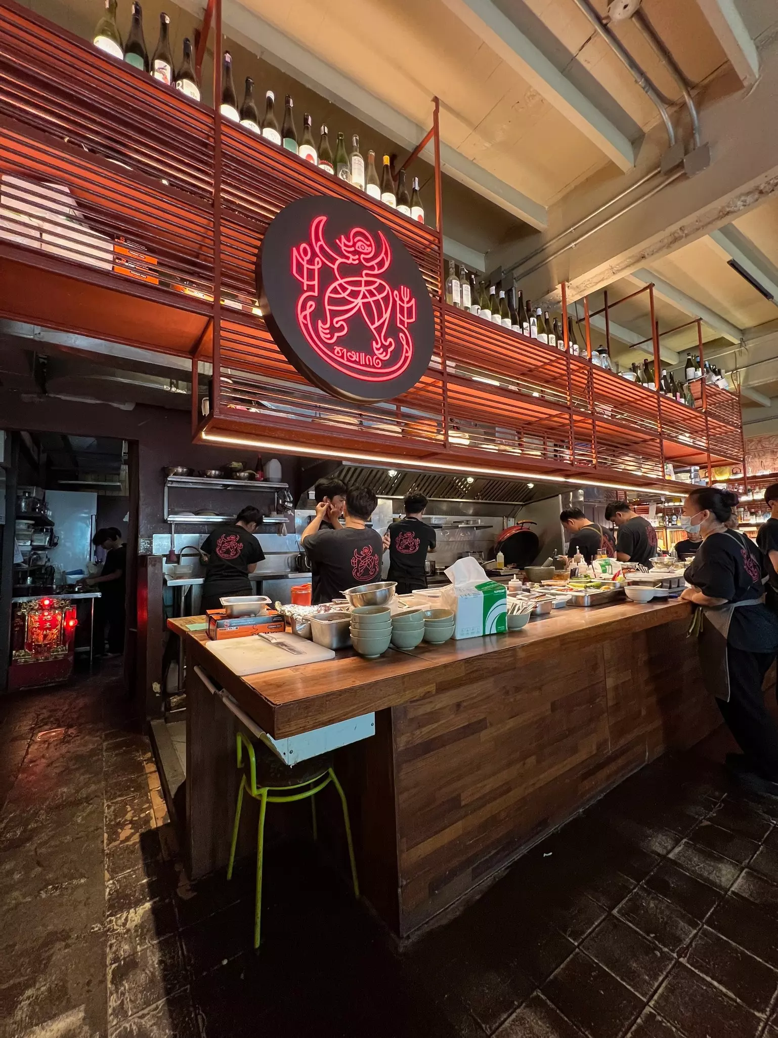 Dishes lined up on the kitchen counter at Charmgang Curry Shop in Bangkok, Thailand.