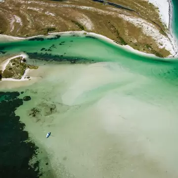 Aerial view of Caladesi Island, Florida, with sandbars and turquoise shallows.