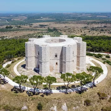 Aerial view of the Castel del Monte in Southern Italy - Octogonal shaped castle built by the Holy Roman Emperor Frederick II in the 13th century in Apulia; Shutterstock ID 1801891420; your: Bridget Brown; gl: 65050; netsuite: Online Editorial; ful...