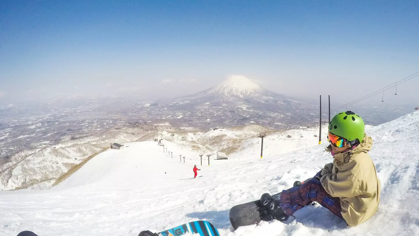 A landscape picture of the graffiti and the sloped road