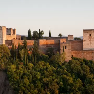 Alcazaba Alhambra Golden Hour Panorama in Granada, Spain. This photograph was taken at twilight from San Nicolas church in Albaicin.