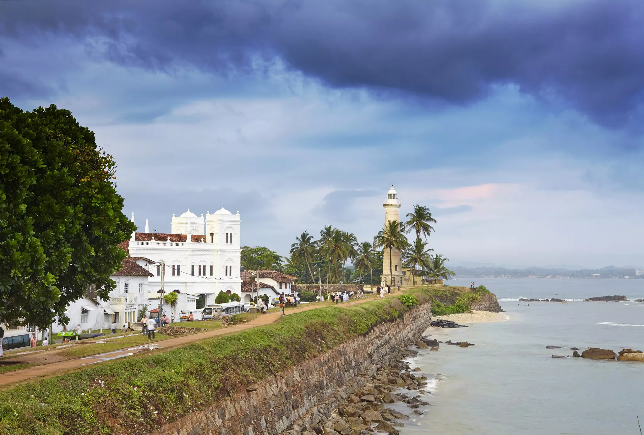 Coastal ramparts surrounding a fort and lighthouse