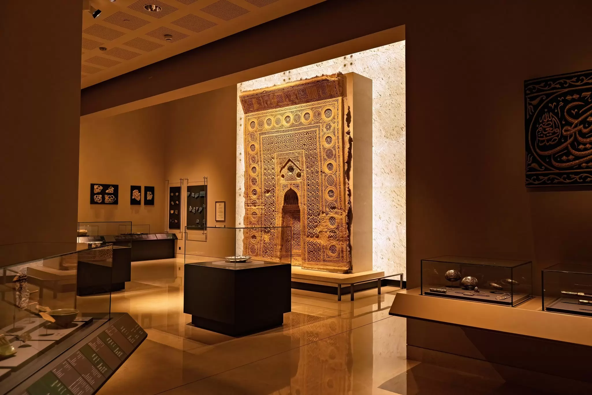A large stone engraved doorway in a museum exhibit: the National Museum of Oman, Muscat. 