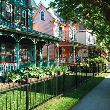 Cape May, NJ, USA June 3  A row of Victorian homes sit on a tree lined street in the charming Jersey Shore community of Cape May New Jersey, License Type: media, Download Time: 2025-09-02T16:33:49.000Z, User: Norma.PrauseBrewer_LonelyPlanet, Editorial: true, purchase_order: 56530 - Guidebooks, job: Global Publishing WIP, client: usa-mid-atlantic-2025-planning-map-1, other: Norma Brewer