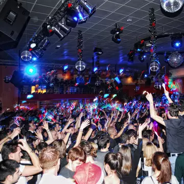 A busy dance floor in a techno club in Berlin, Germany.