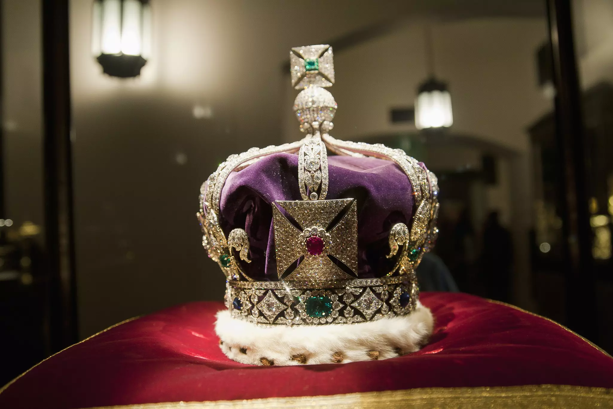 The Imperial State Crown on display inside the Tower of London, England.