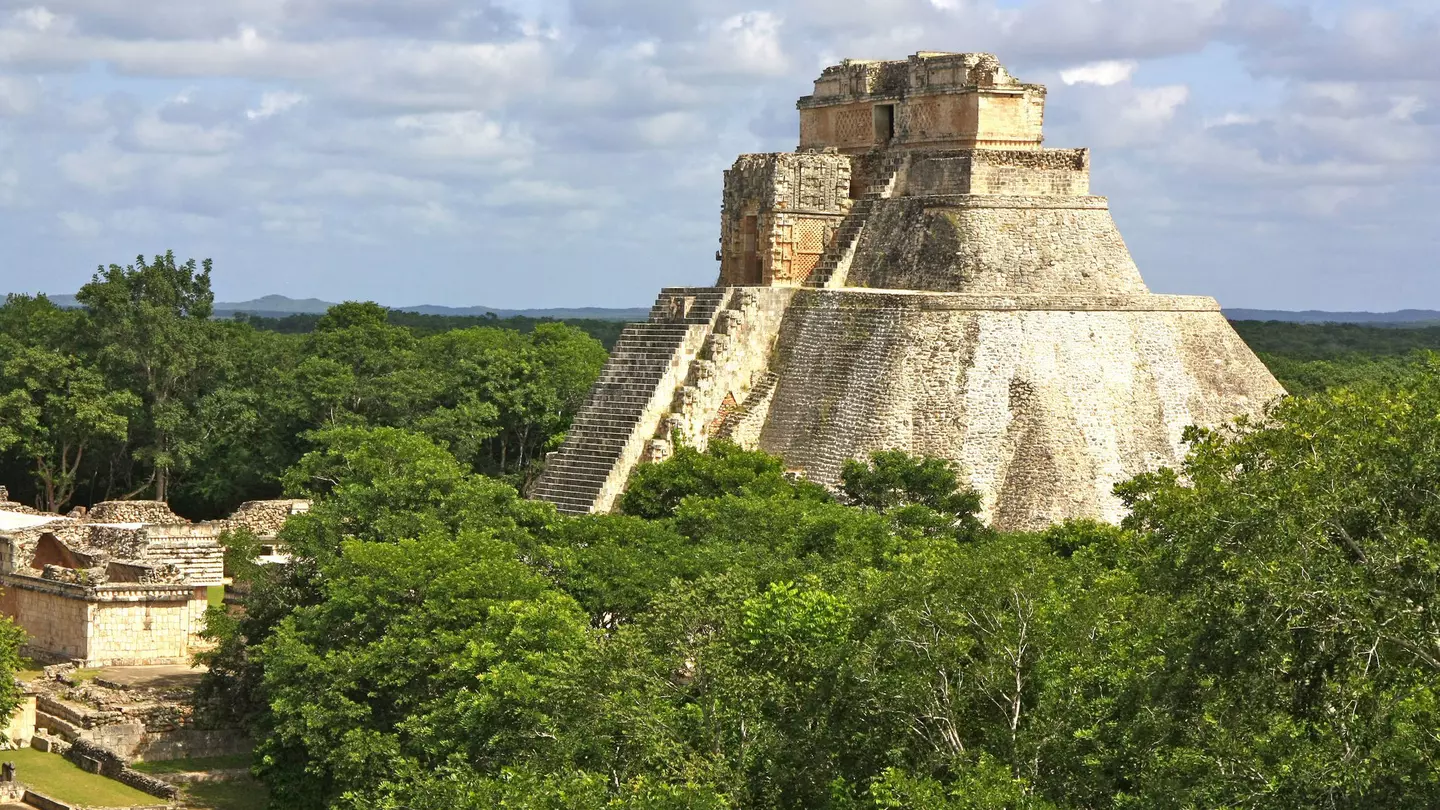 The Yucatán is dotted with Maya cities that showcase incredible architecture like the Temple of the Magician at Uxmal. P. Lubas / Getty Images