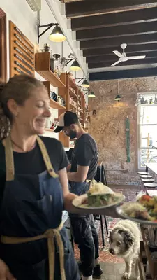 A spread of pastries displayed in plates on a large table