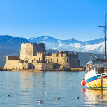 The island fortress of Bourtzi, in the harbor of Nafplio, Greece. Georgios Tsichlis/Alamy Stock Photo