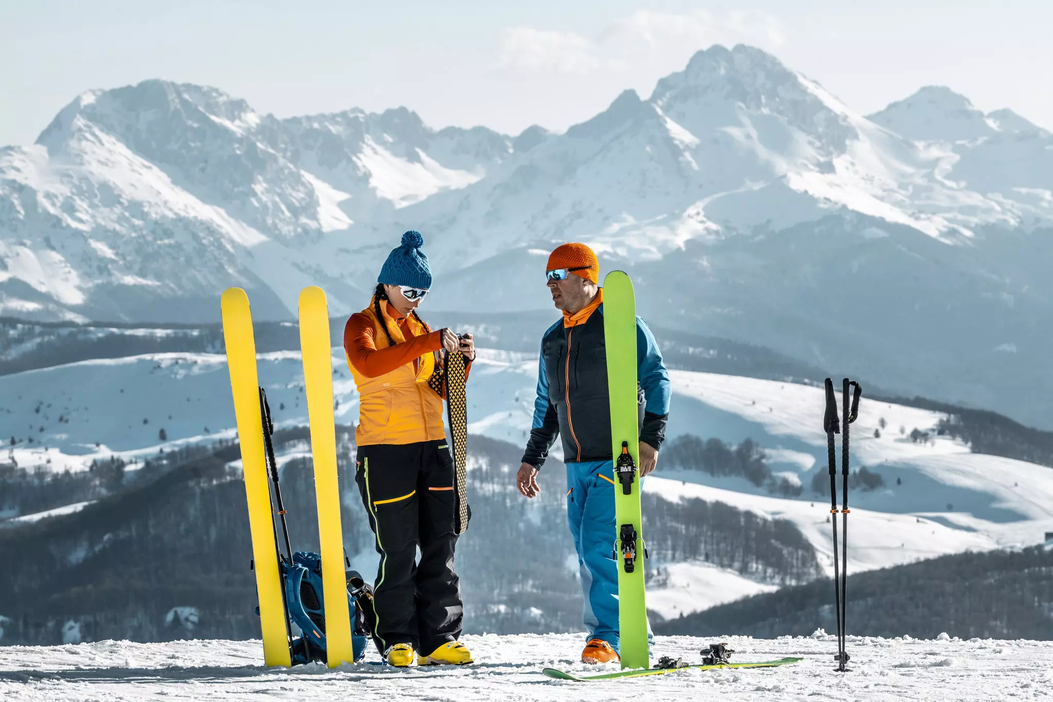 Skiier taking a break on a mountain slope in Montenegro.