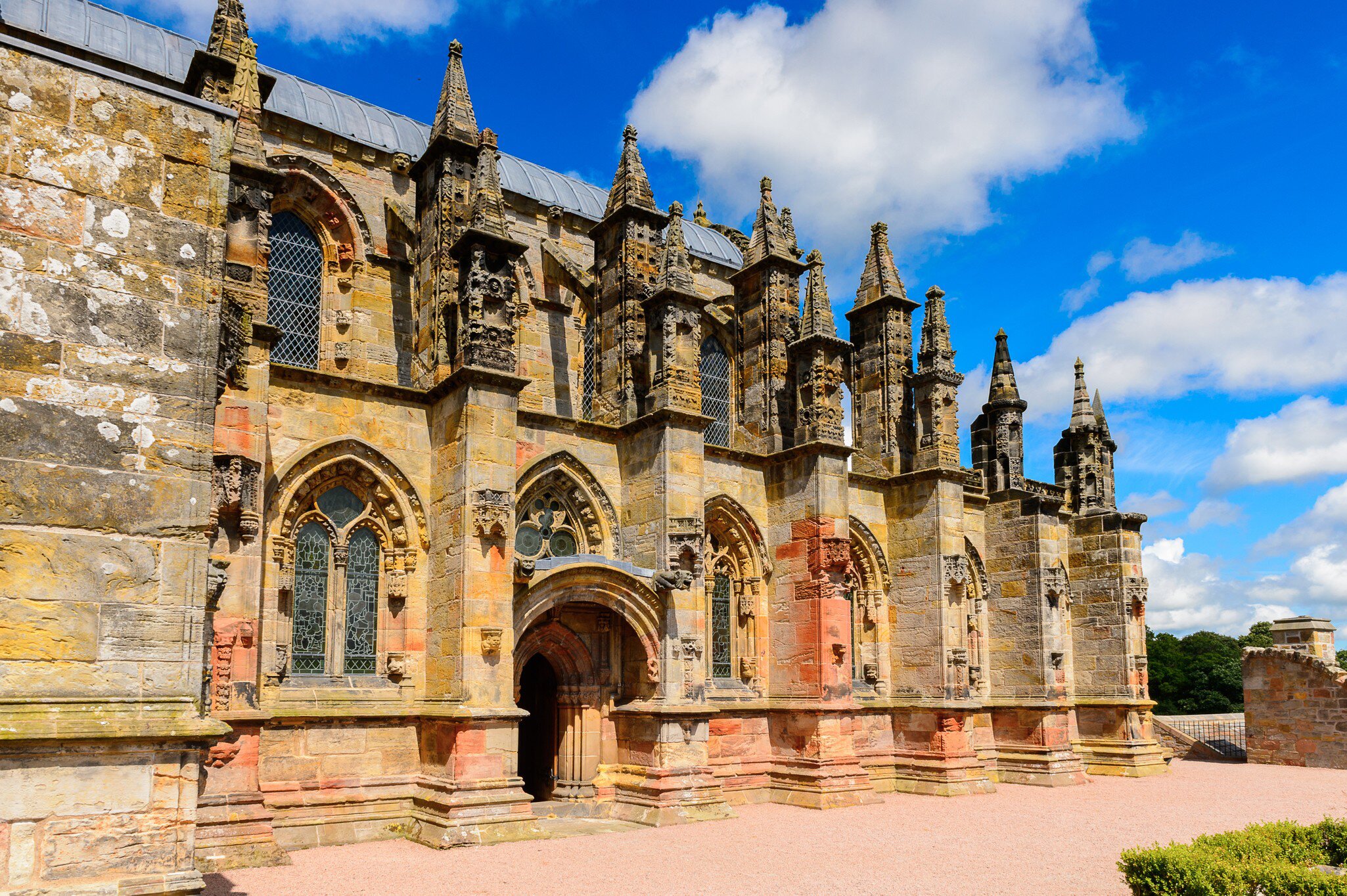 The exterior of Rosslyn Chapel (Collegiate Chapel of St Matthew), founded by William Sinclair, known for being mentioned in The Da Vinci Code book.