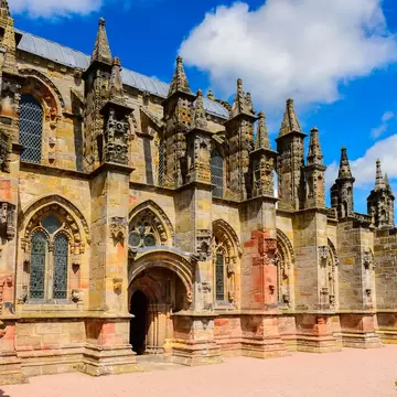 The exterior of Rosslyn Chapel (Collegiate Chapel of St Matthew), founded by William Sinclair, known for being mentioned in The Da Vinci Code book.