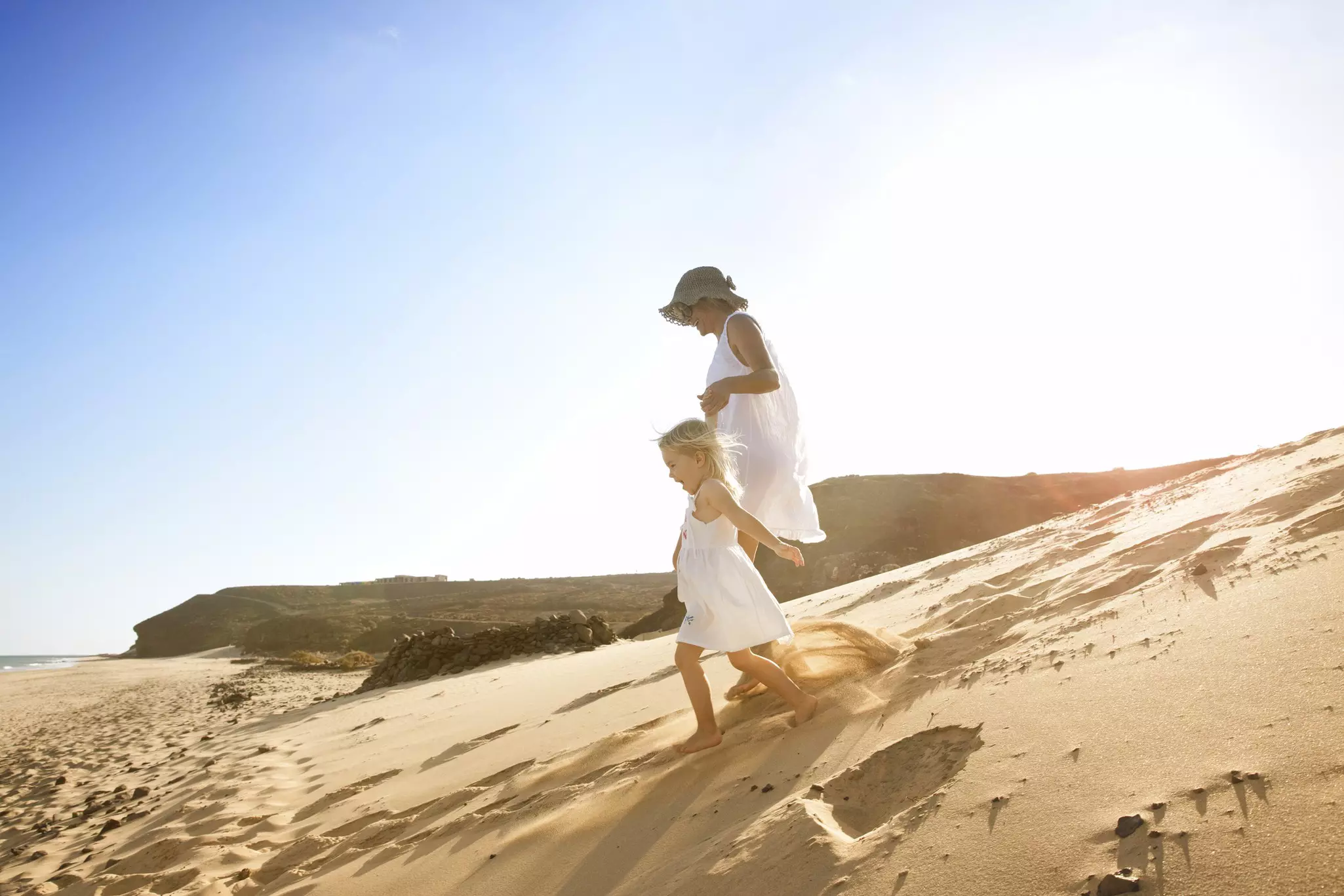 Mother and toddler on El Salmo beach in Fuerteventura, Canary Islands