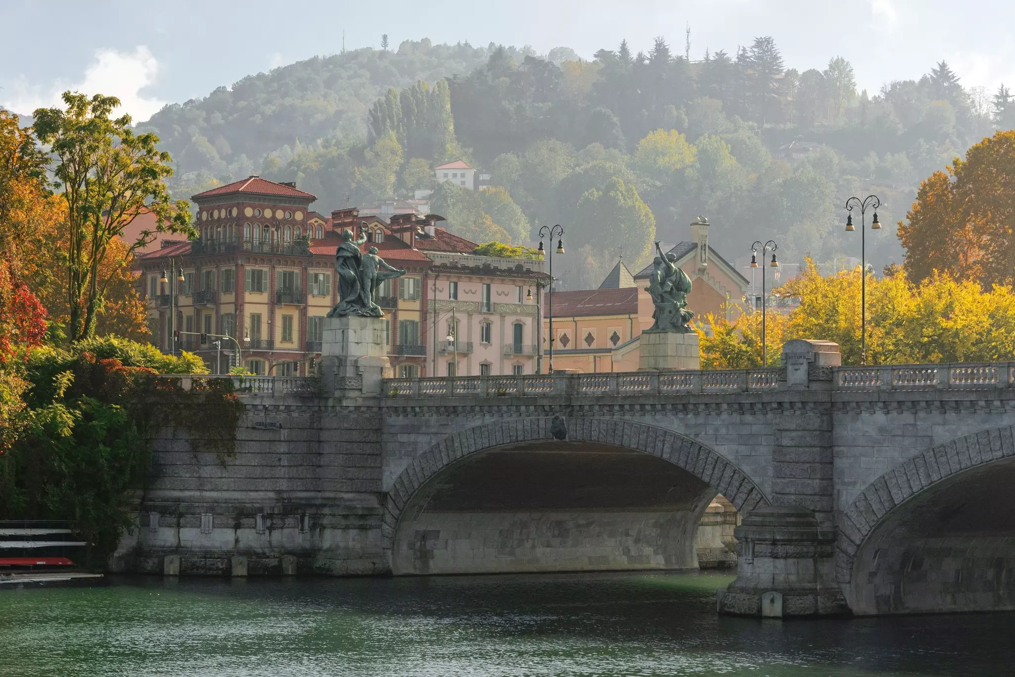 Umberto I bridge, Turin, Piemont, Italy. View of the autumn hills of the west side of the Po river in Turin; Shutterstock ID 2400633659; purchase_order:65050 - Digital Destinations and Articles; job:Online editorial; client:Weekends in Italy; other:Ann...