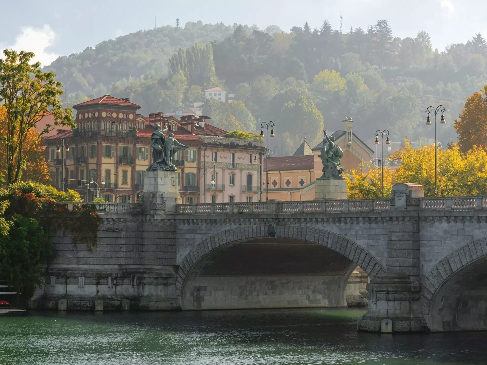 Umberto I bridge, Turin, Piemont, Italy. View of the autumn hills of the west side of the Po river in Turin; Shutterstock ID 2400633659; purchase_order:65050 - Digital Destinations and Articles; job:Online editorial; client:Weekends in Italy; other:Ann...