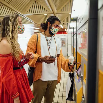 Couple Buying Their Train Ticket in london solstock GettyImages-1281261744 rfc.jpg