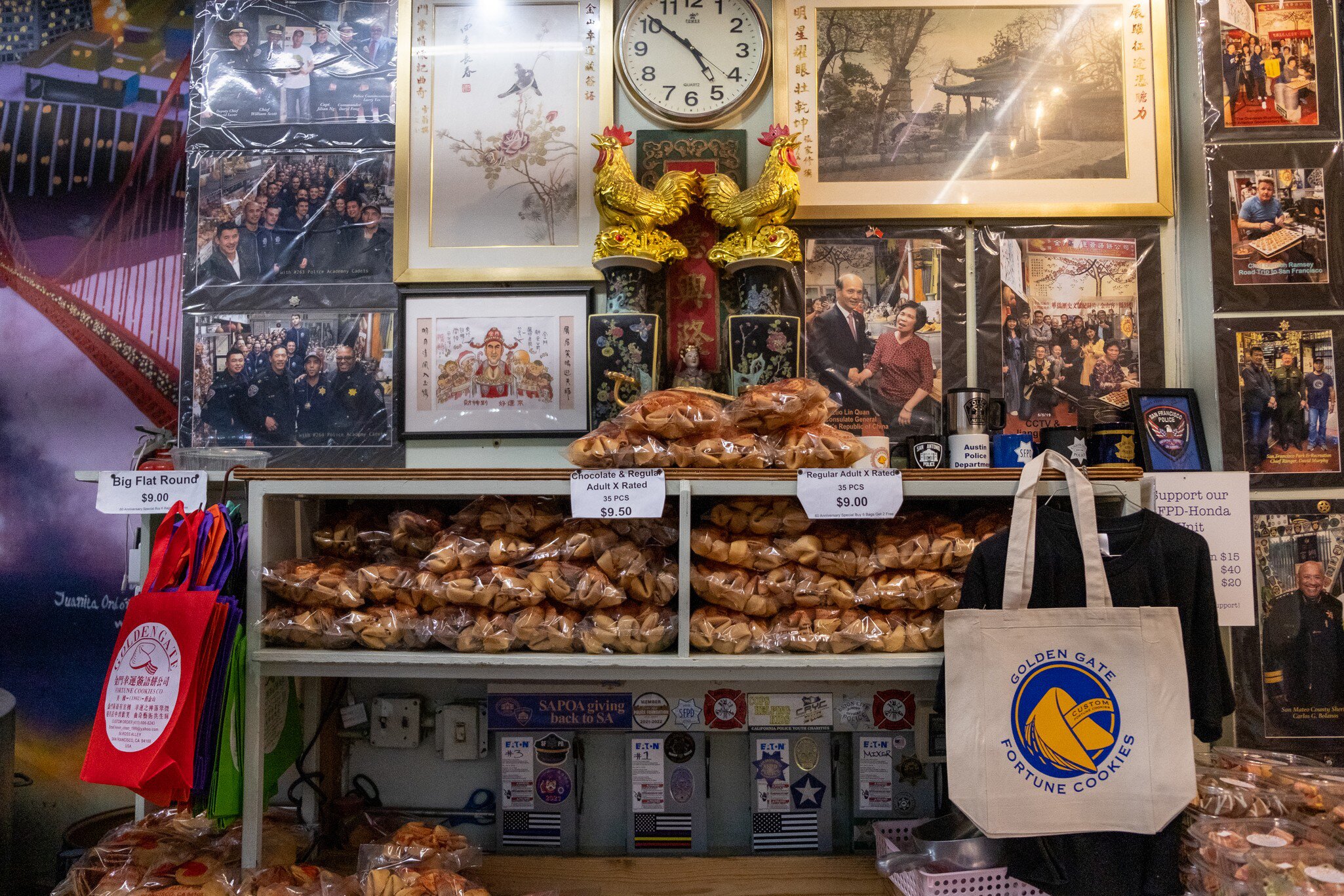 Founded in 1962, the Golden Gate Fortune Cookie Factory has been dedicated to producing handmade, high quality and customizable fortune cookies. Located in Ross Alley in the heart of San Francisco's Chinatown, visitors from all over the world are invited inside our shop to experience the cookie making process in person.,,Up to 10,000 fortune cookies are made a day, depending on the season! Cookies are baked fresh on a copper slow-release heat rotating griddle wheel. They are then gently twisted into the famous fortune cookie shape as the message is carefully placed inside. In addition to the traditional vanilla flavored cookies, they make chocolate, strawberry, green tea and glazed cookies.