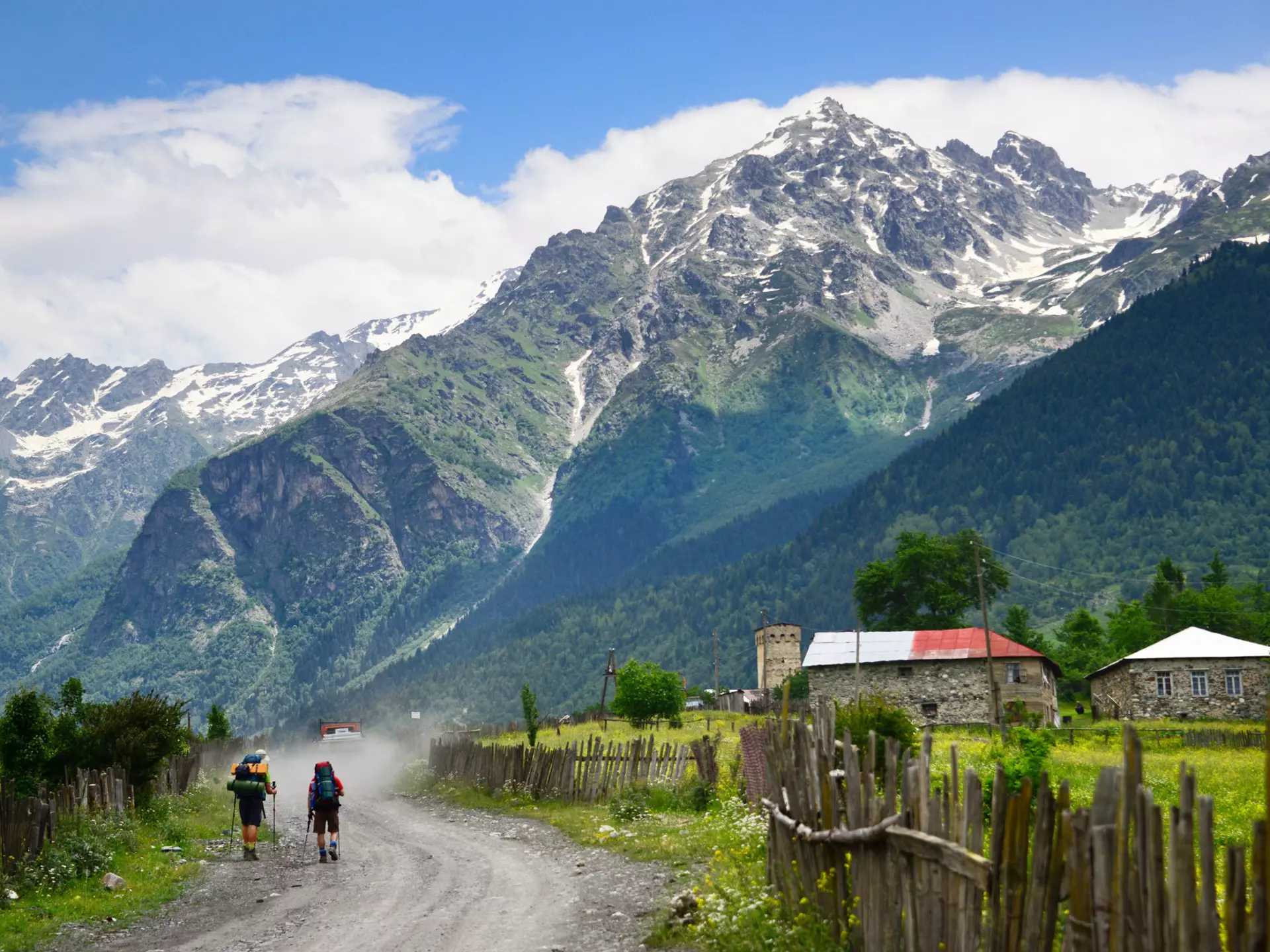 Hikers in the Svaneti region. Maya Karkalicheva / Getty Images