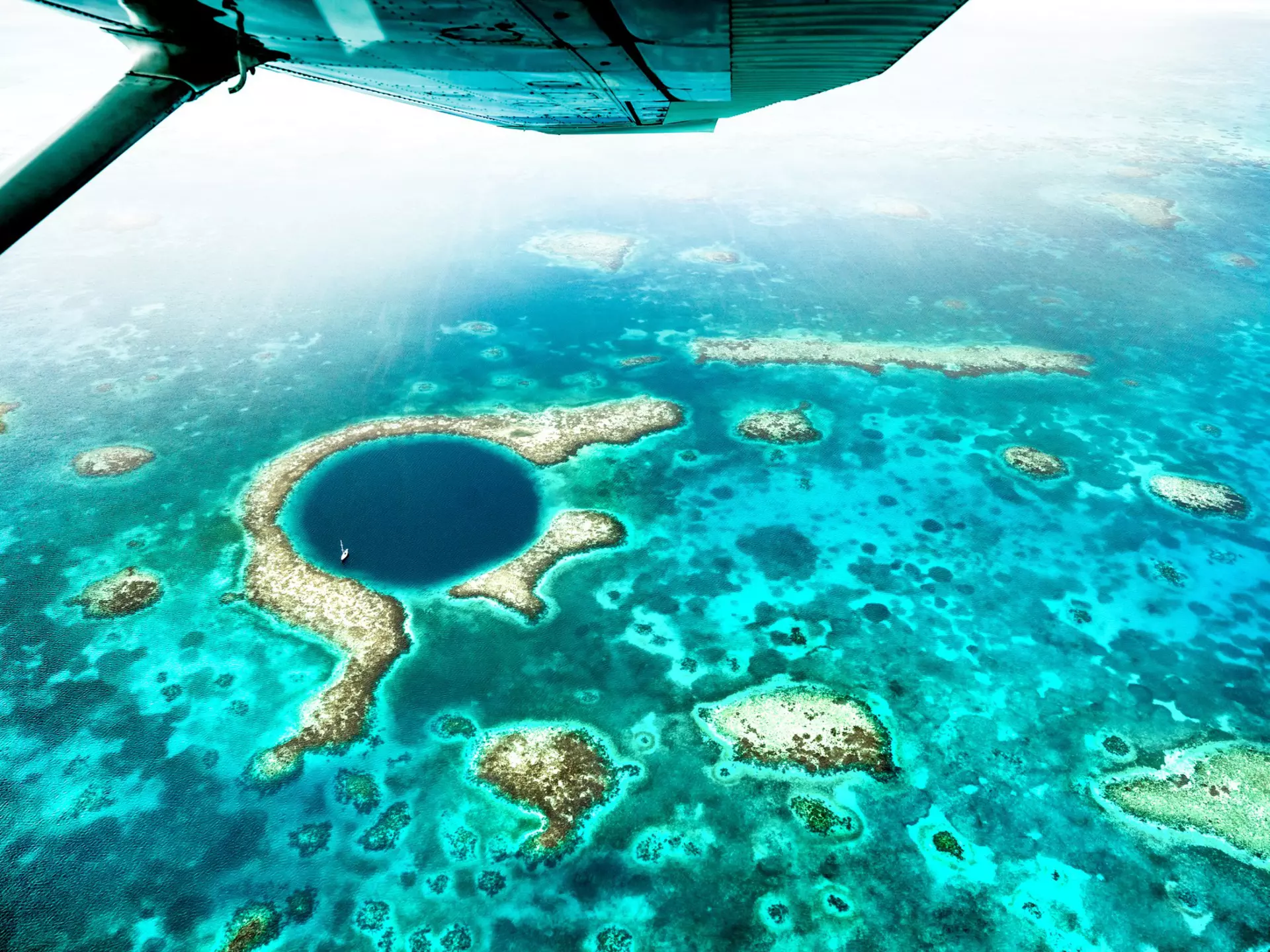 Belize’s popular Great Blue Hole isn’t the country’s only worthy dive site. © iStock