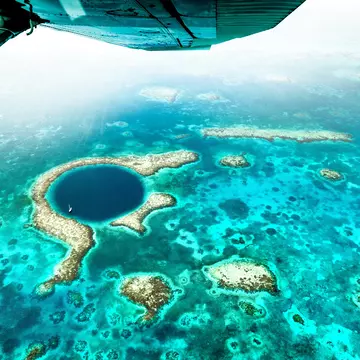 Belize’s popular Great Blue Hole isn’t the country’s only worthy dive site. © iStock