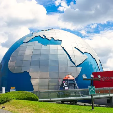 TOULOUSE, FRANCE - JULY, 2018: The planetarium  in the City of Space 'Cite de l'espace', decorated as planet Earth; Shutterstock ID 1154206081; your: Sloane Tucker; gl: 65050; netsuite: Online Editorial; full: POI