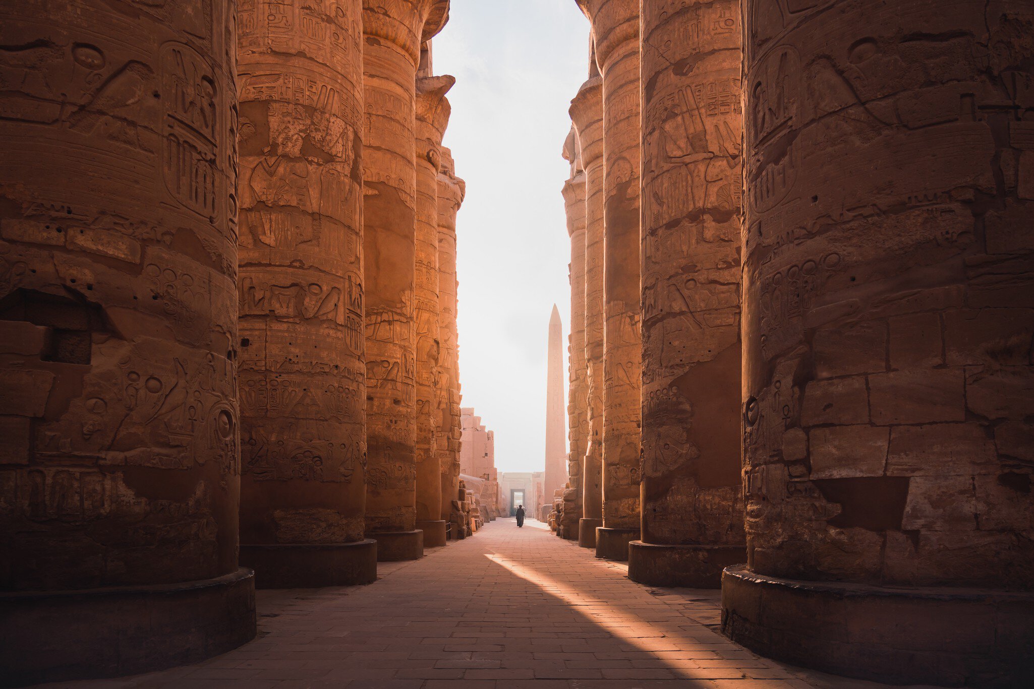 ancient corridor and columns of Karnak temple complex in Luxor city Egpyt during sunrise