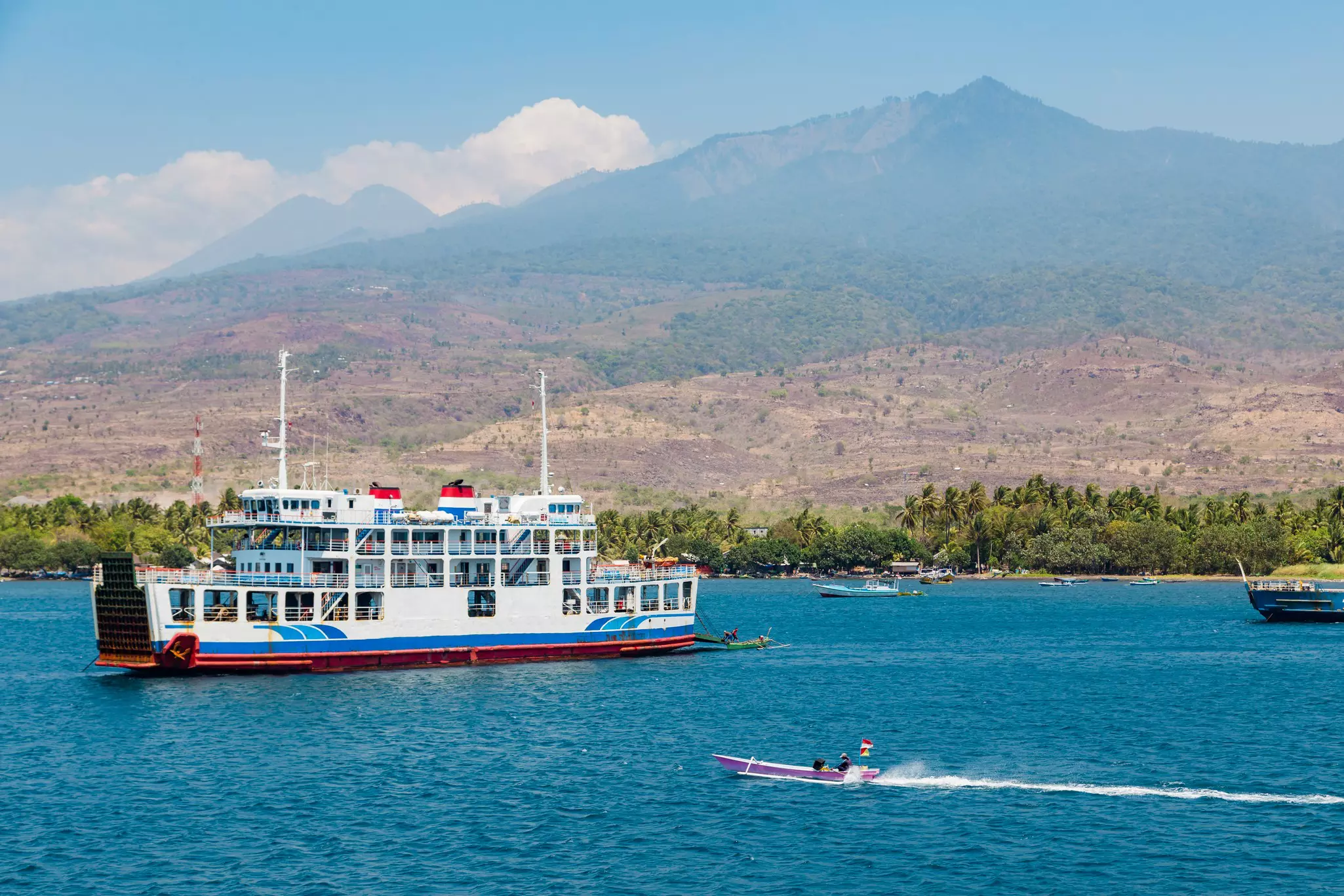 A passenger ferry off the shore of the island of Lombok, Indonesia