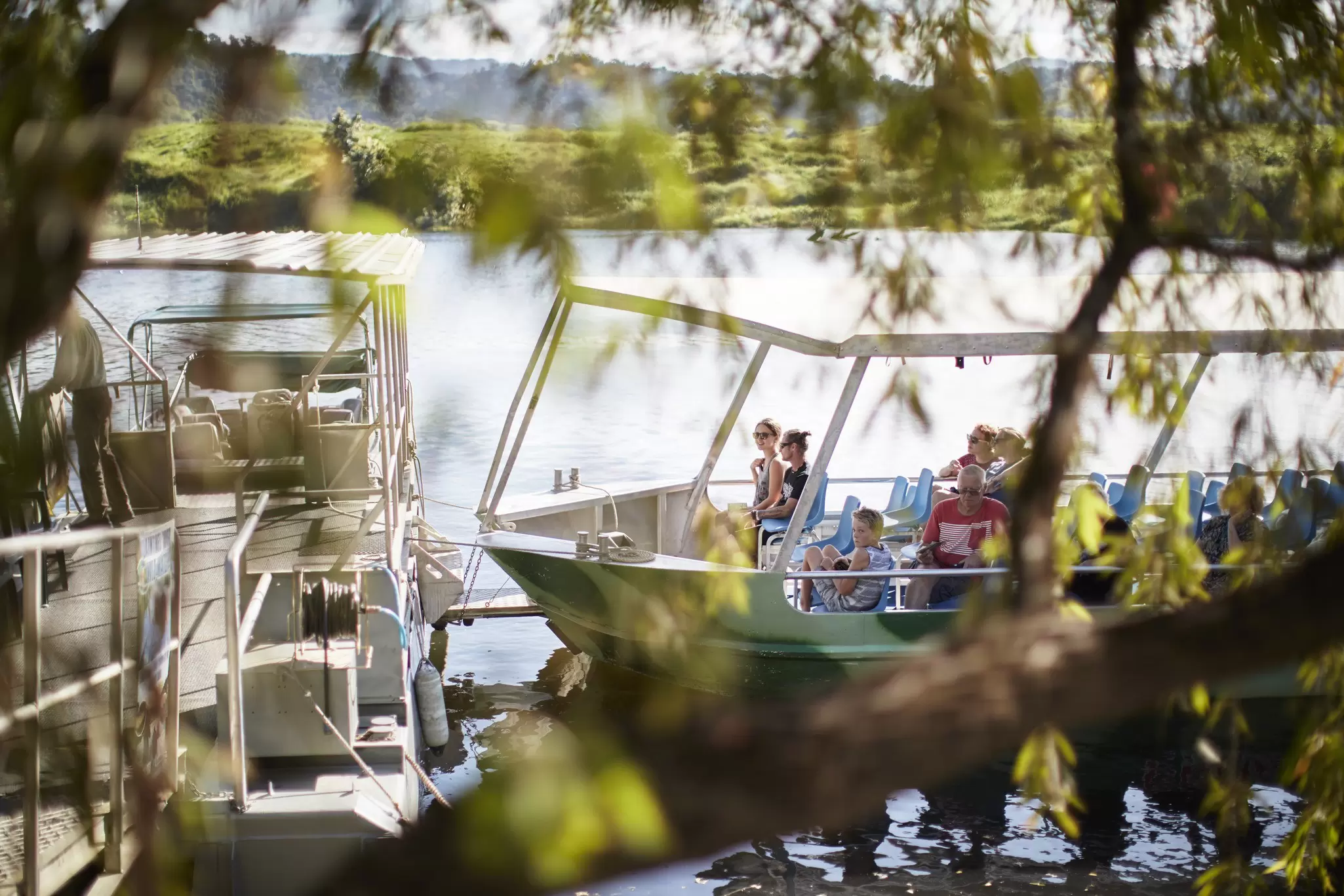 People on a river cruise in Daintree National Park, Australia.