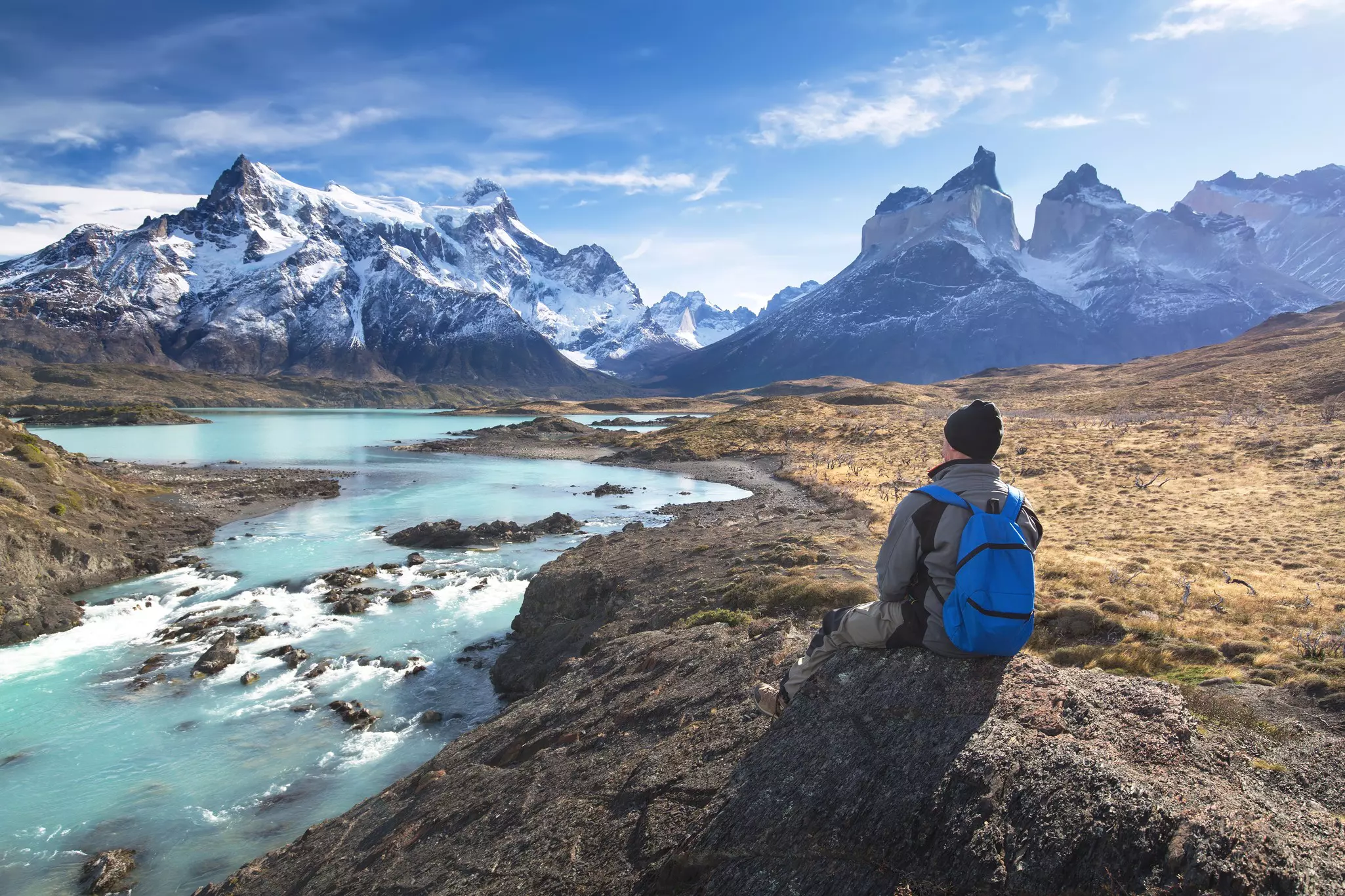 Hiker in a national park Torres del Paine, Patagonia, Chile.