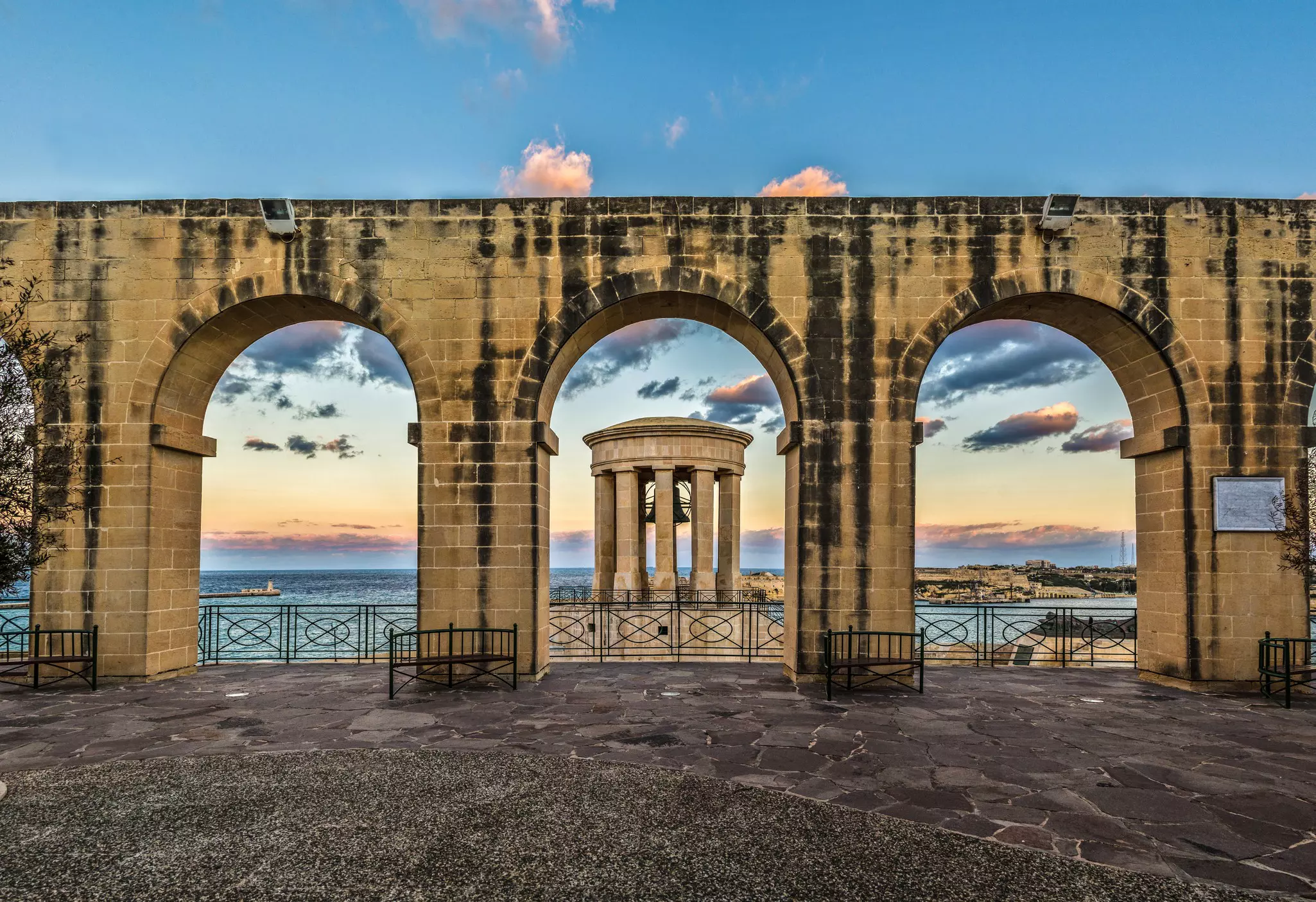 The monument of the Unknown Sailor in Valletta port with water view
