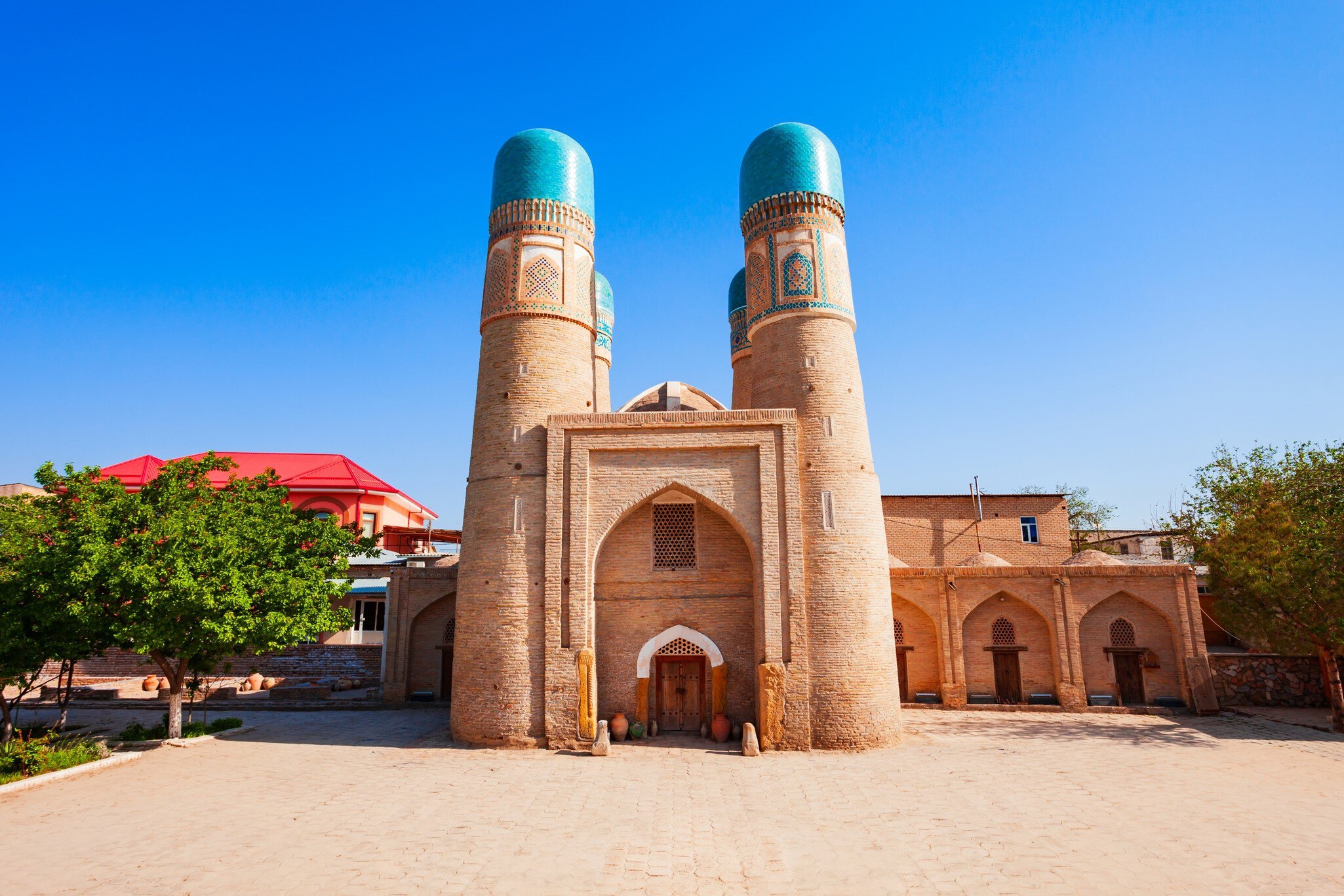Chor Minor or Char Minar or Madrasah of Khalif Niyaz-kul in the historic city of Bukhara, Uzbekistan; Shutterstock ID 2220041901;