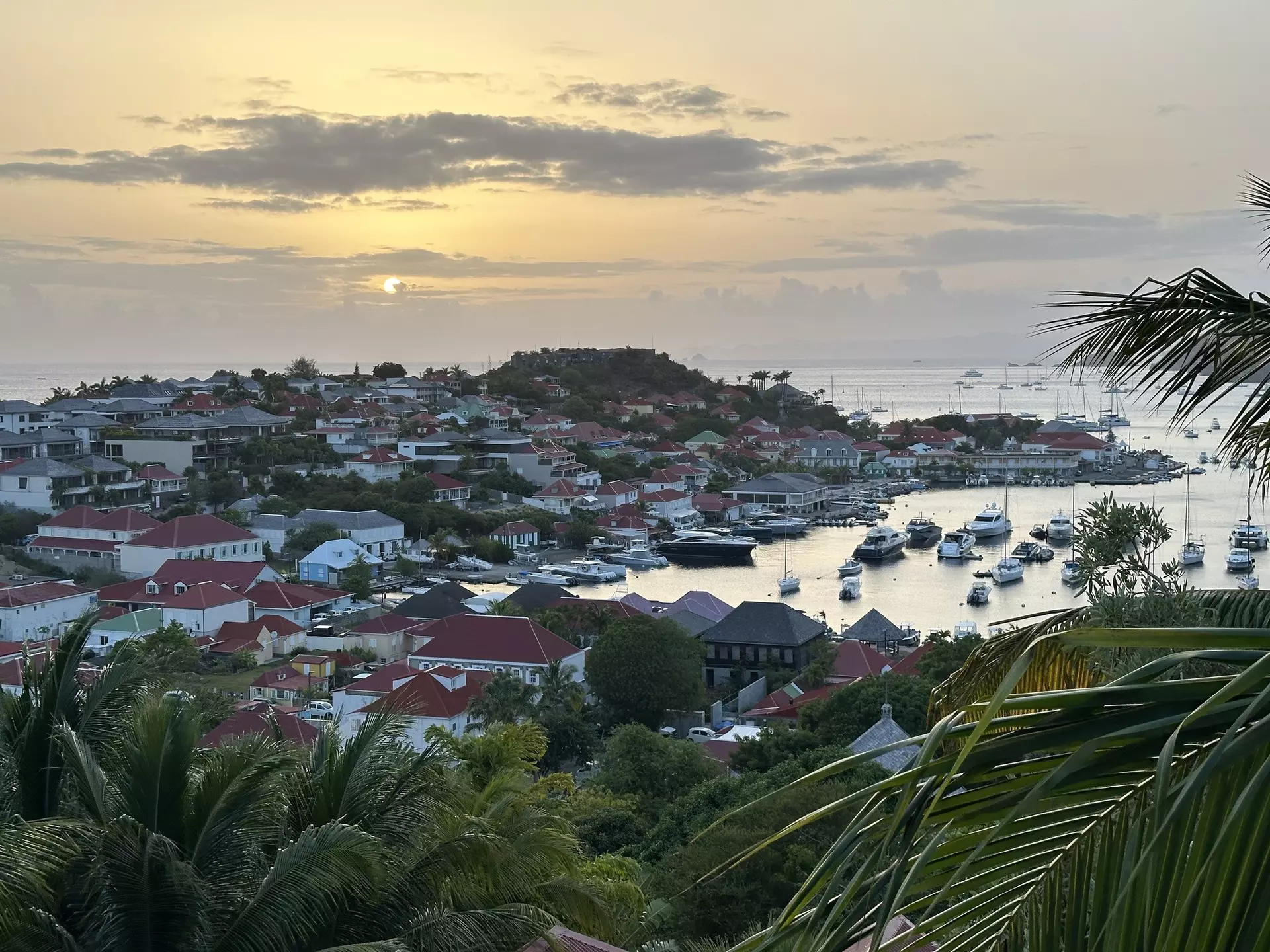 Gustavia, the capital of the Caribbean island Saint Barthélemy, at sunset. Melissa Yeager/Lonely Planet