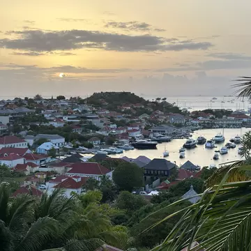 Gustavia, the capital of the Caribbean island Saint Barthélemy, at sunset. Melissa Yeager/Lonely Planet