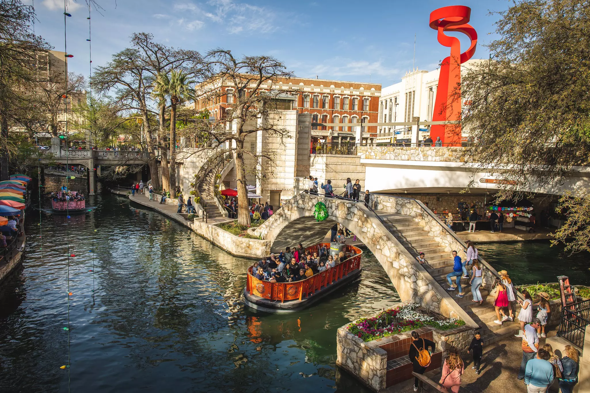 The River Walk and Torch of Friendship statue in San Antonio, Texas. Benjamin Yanto for Lonely Planet