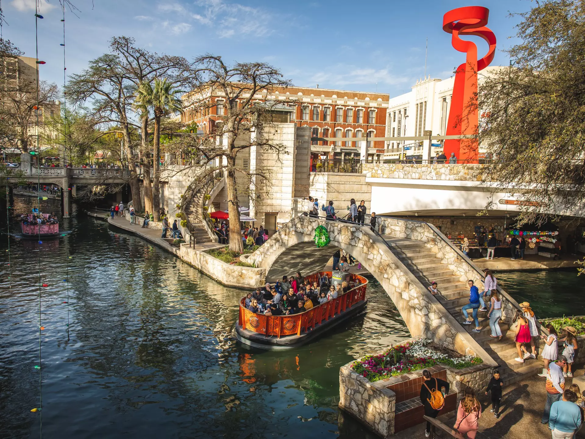 The River Walk and Torch of Friendship statue in San Antonio, Texas. Benjamin Yanto for Lonely Planet