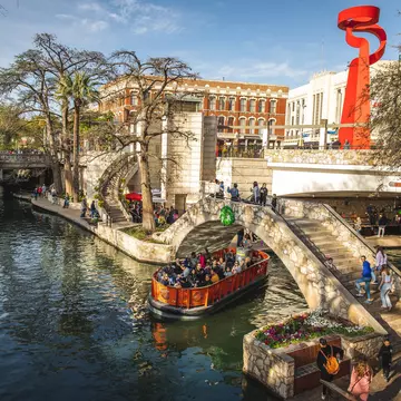 The River Walk and Torch of Friendship statue in San Antonio, Texas. Benjamin Yanto for Lonely Planet