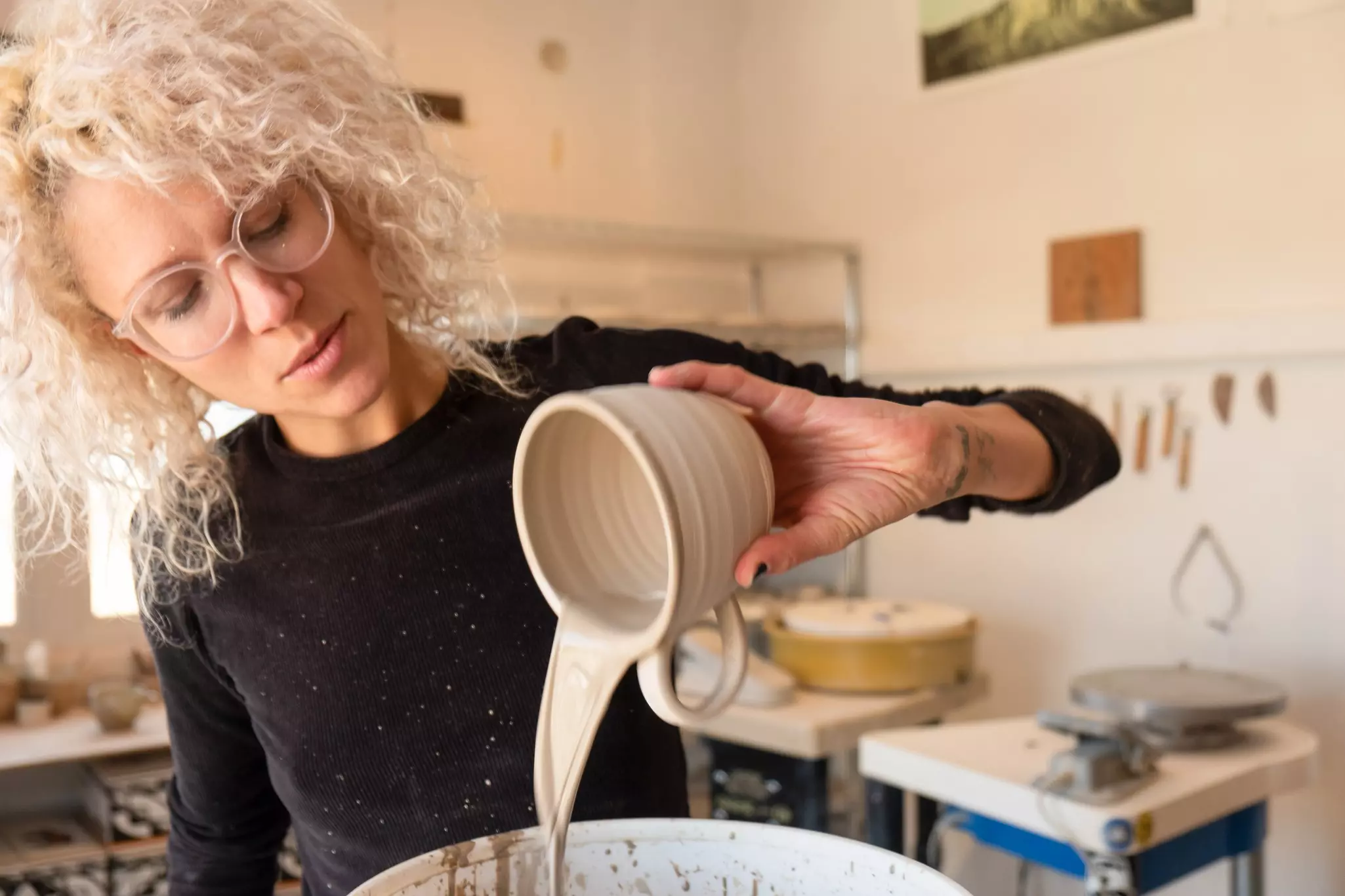 Kimmy Rohrs of Whiskey and Clay makes pottery in her studio in Santa Fe, New Mexico © Avi Farber / Lonely Planet