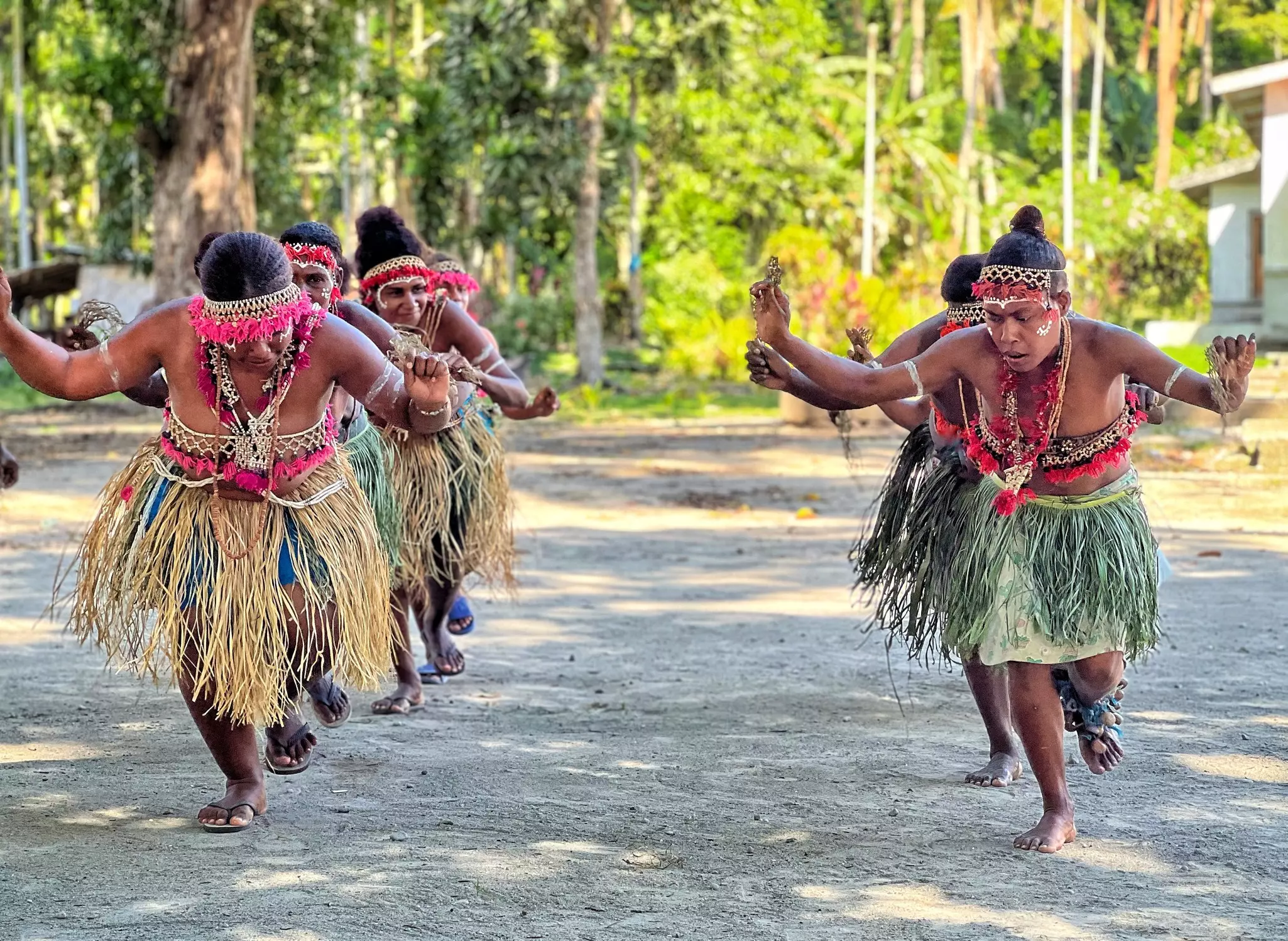 Crowds sit around tables and peruse goods in a very warm atmosphere.