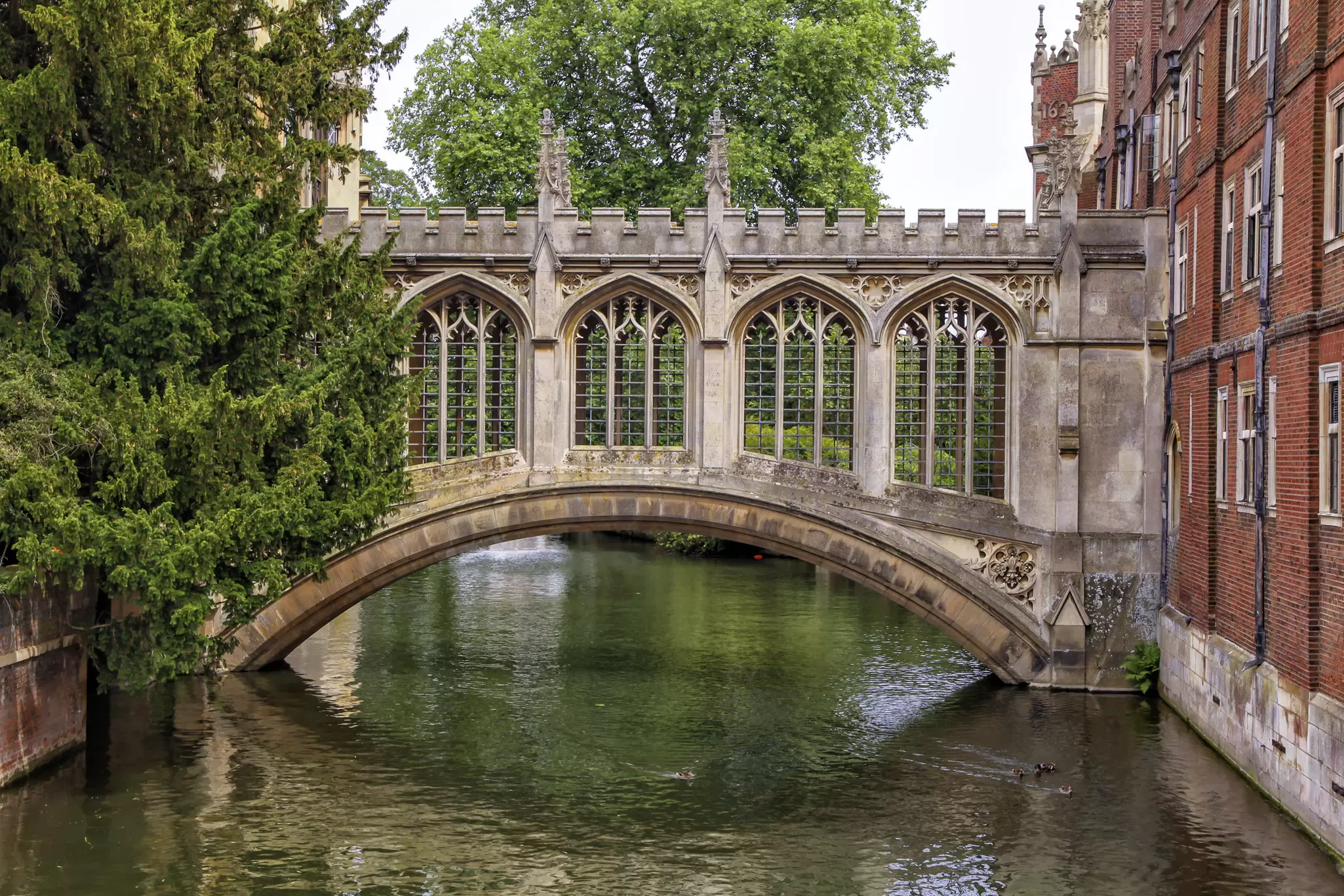 View of the Bridge of Sighs crossing the river at Cambridge University in the UK.