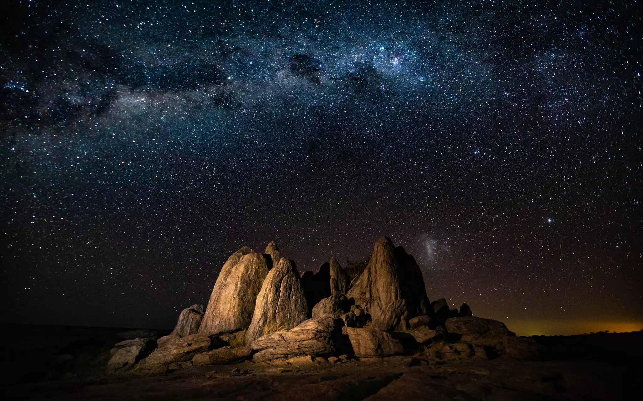 Starscape landscape with natural rocks in the foreground at Kubu Island , Botswana,, License Type: media, Download Time: 2025-12-02T20:11:57.000Z, User: katelyn.perry_lonelyplanet, Editorial: false, purchase_order: 65050 - Digital Destinations and Articles, job: wip, client: wip, other: Katelyn Perry