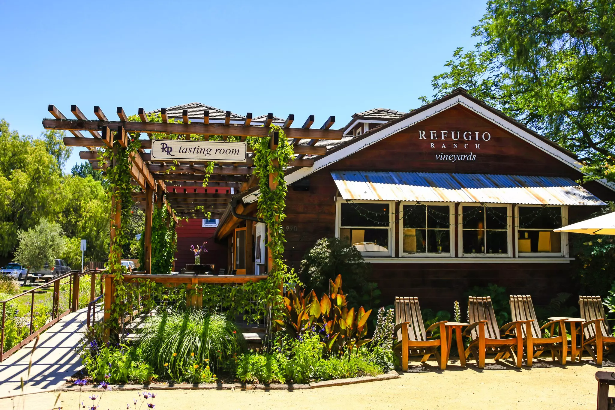 The external facade of the Refugio wine tasting store in Los Olivos, CA