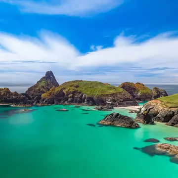 Blue seas and blond sands on the beach in Cornwall. Lukasz Suchocki/Shutterstock
