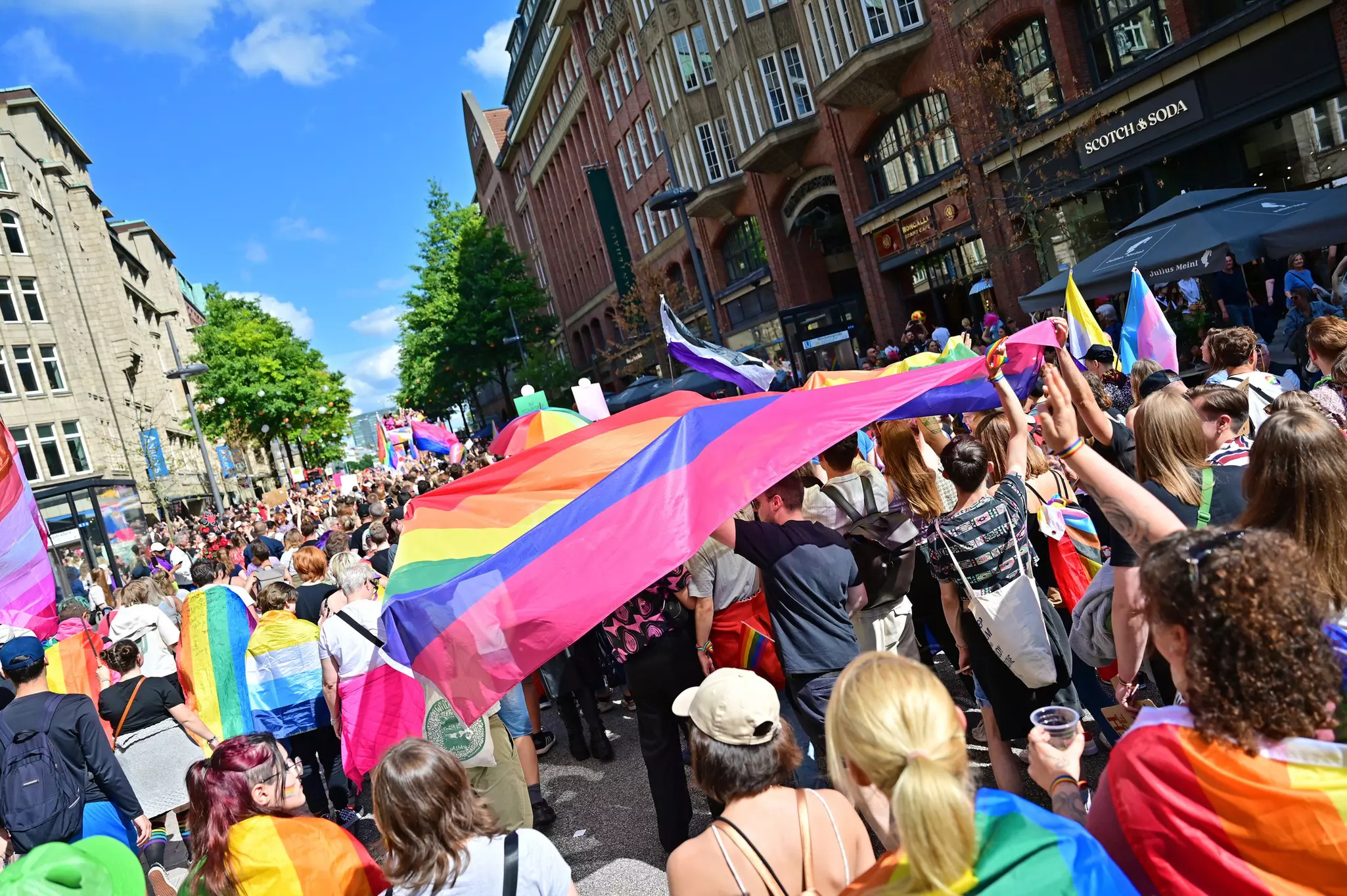 A lively LGBTIQ+ pride march in Hamburg, Germany.