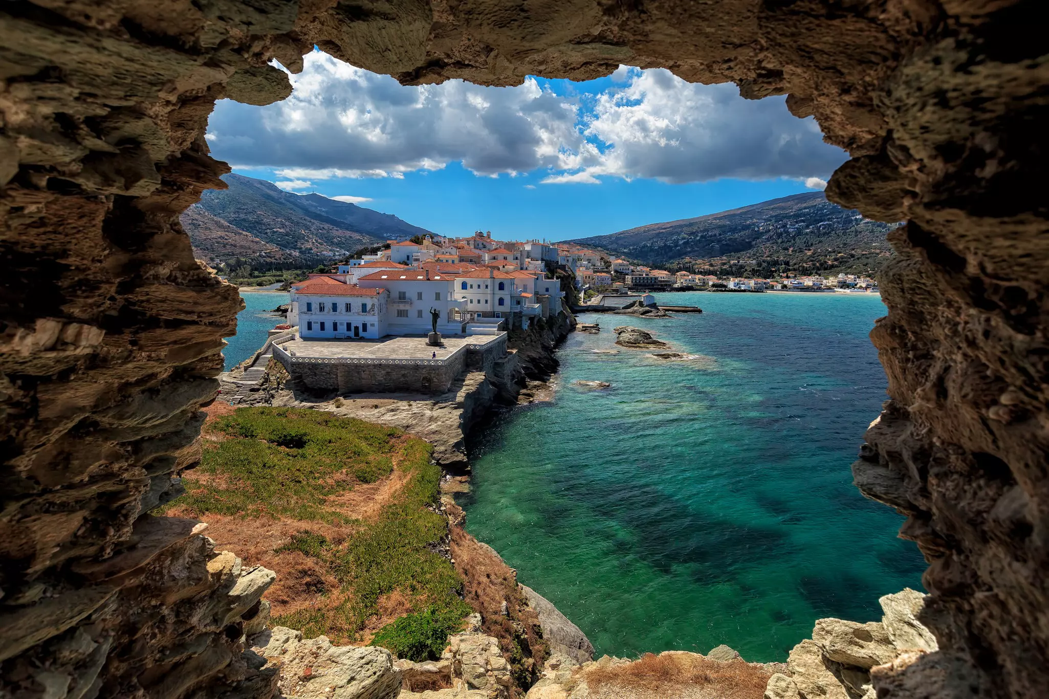 The beautiful town of Chora in Andros island, Cyclades, Greece, built on a cape, viewed from a ruin  License Type: media  Download Time: 2023-01-28T13:20:17.000Z  User: Norma.PrauseBrewer_LonelyPlanet  Is Editorial: No  purchase_order:   